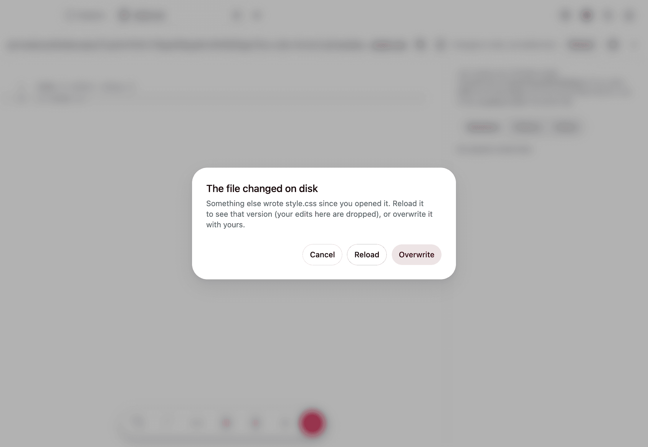 The editor refusing to clobber: the file changed on disk under your edits, so you reload or overwrite on purpose.